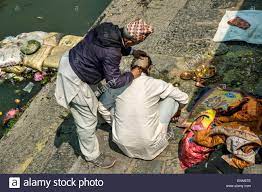 Indian Head Shaving Ceremony High Resolution Stock Photography and Images -  Alamy